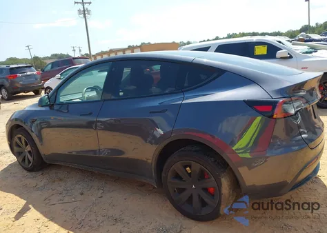 2023 Tesla Model Y Awd/Long Range Dual Motor All-Wheel Drive z USA, uszkodzony, nr VIN 7SAYGDEE9PF613842
